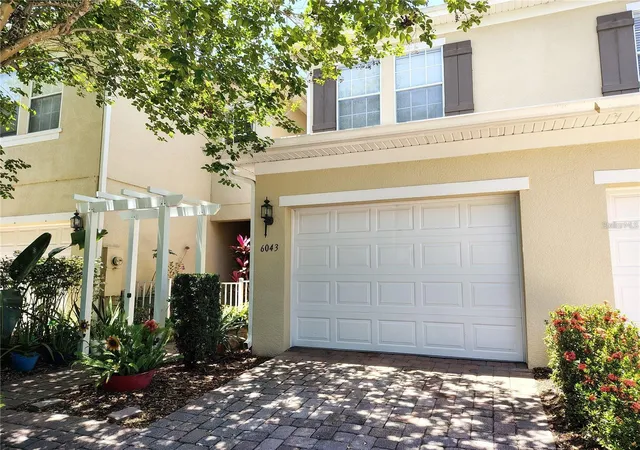 Photo 1 of Townhouse for sale at 6043 Strada Isle Way, Orlando, FL 32835 | MLS# V4947422 | Listing updated on 2026-09-09