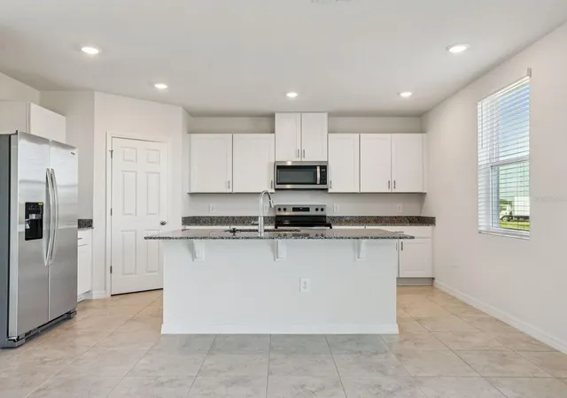 Photo 1 of Single family home for sale at 799 Sunshower Dr, Lady Lake, FL 32159 | MLS# TB8484366 | Listing updated on 2026-09-16