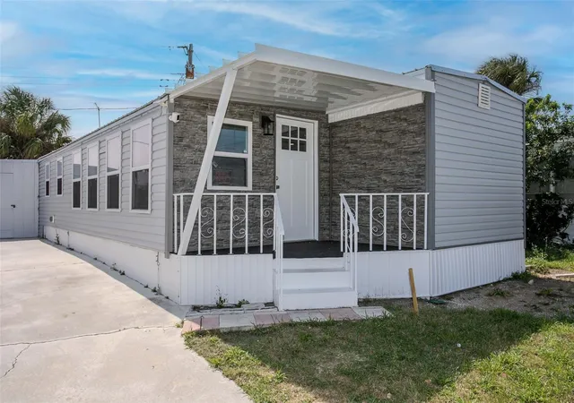 Photo 2 of Manufactured home for sale at 410 W 51st Avenue Dr, Bradenton, FL 34207 | MLS# A4686631 | Listing updated on 2026-09-17