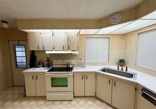 Photo 3 of Manufactured home for sale at 6571 NE 1st Place, Ocala, FL 34470 | MLS# OM721243 | Listing updated on 2026-09-16