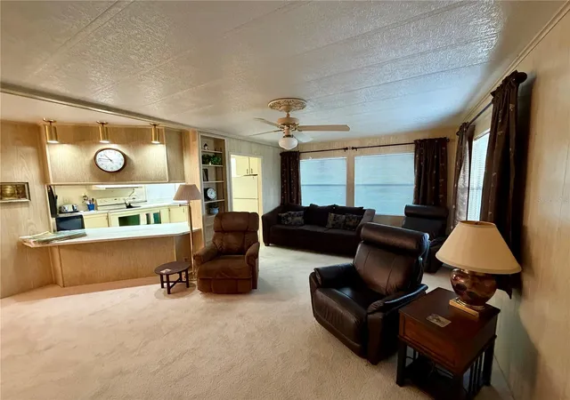 Photo 4 of Manufactured home for sale at 6571 NE 1st Place, Ocala, FL 34470 | MLS# OM721243 | Listing updated on 2026-09-16