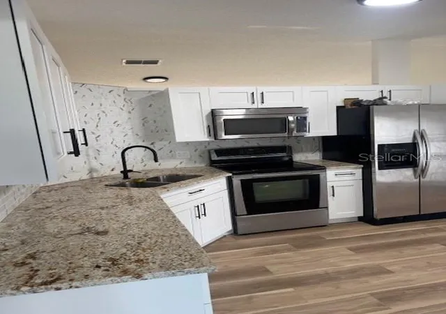 Photo 2 of Single family home for sale at 420 Albatross Ct, Kissimmee, FL 34759 | MLS# O6392714 | Listing updated on 2026-09-16