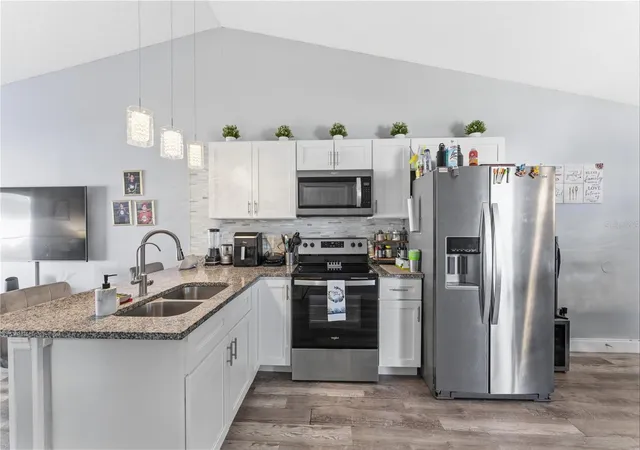 Photo 2 of Single family home for sale at 114 Winter Ridge Cir, Orlando, FL 32835 | MLS# O6393420 | Listing updated on 2026-09-16
