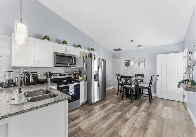 Photo 3 of Single family home for sale at 114 Winter Ridge Cir, Orlando, FL 32835 | MLS# O6393420 | Listing updated on 2026-09-16