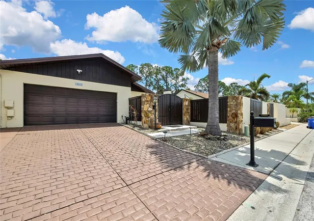Photo 2 of Single family home for sale at 13522 Avista Dr, Tampa, FL 33624 | MLS# TB8499389 | Listing updated on 2026-09-17