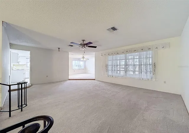 Photo 3 of Sale Pending at 9811 Woodstock Ln, Port Richey, FL 34668 | MLS# W7884997 | Listing updated on 2026-09-16