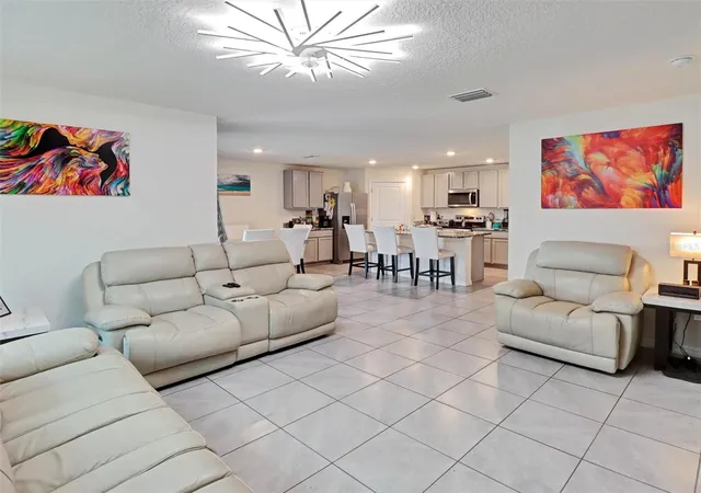 Photo 3 of Single family home for sale at 1202 Tahitian Sunrise Dr, Plant City, FL 33565 | MLS# TB8501210 | Listing updated on 2026-09-17