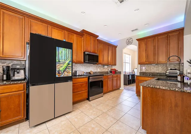 Photo 4 of Single family home for sale at 9808 Bennington Chase Dr, Orlando, FL 32829 | MLS# O6405715 | Listing updated on 2026-09-17