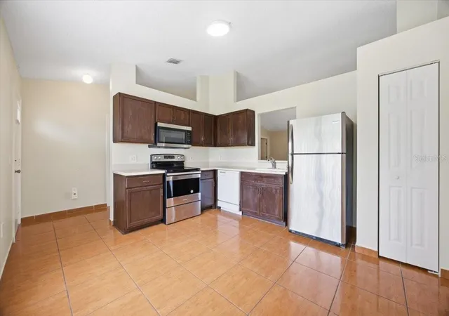 Photo 3 of Single family home for sale at 718 Pincon Ln, Kissimmee, FL 34759 | MLS# S5149493 | Listing updated on 2026-10-17
