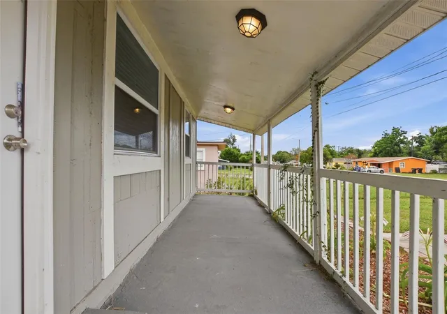 Photo 2 of Single family home for sale at 6033 W Amelia St, Orlando, FL 32835 | MLS# O6408294 | Listing updated on 2026-10-02