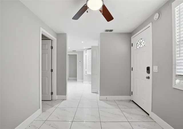 Photo 4 of Single family home for sale at 6033 W Amelia St, Orlando, FL 32835 | MLS# O6408294 | Listing updated on 2026-10-02