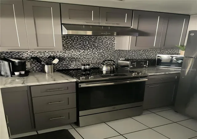 Listing Photo 4 - Condo for sale in building located at 2571 Cyprus Dr, PALM HARBOR, FL 34684 - Unit #1-204