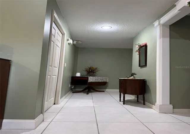 Photo 3 of Single family home for sale at 9814 Oslin St, Tampa, FL 33615 | MLS# TB8512531 | Listing updated on 2026-09-08