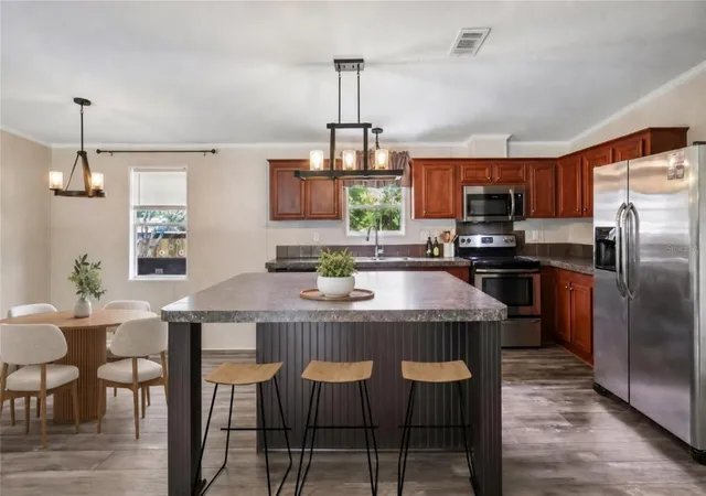 Photo 1 of Manufactured home for sale at 136 Creekwood Run, Lakeland, FL 33809 | MLS# L4962264 | Listing updated on 2026-09-17