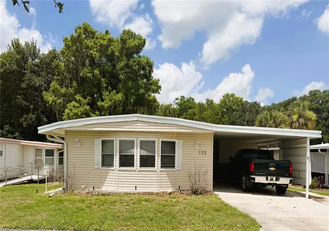 Photo 1 of Manufactured home for sale at 122 Palo Verde Dr, Leesburg, FL 34748 | MLS# R4911337 | Listing updated on 2026-09-24
