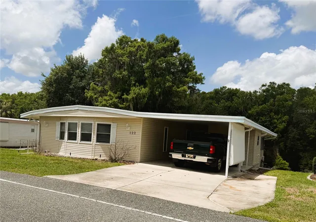 Photo 2 of Manufactured home for sale at 122 Palo Verde Dr, Leesburg, FL 34748 | MLS# R4911337 | Listing updated on 2026-09-24