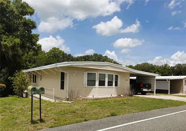 Photo 3 of Manufactured home for sale at 122 Palo Verde Dr, Leesburg, FL 34748 | MLS# R4911337 | Listing updated on 2026-09-24