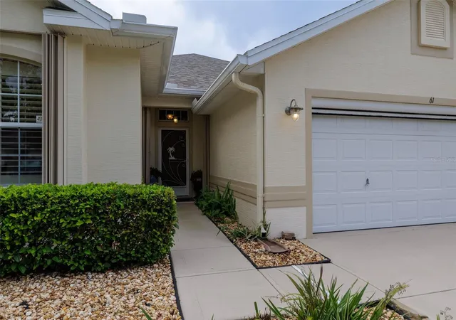 Photo 3 of Single family home for sale at 61 Raintree Cir, Palm Coast, FL 32164 | MLS# FC318946 | Listing updated on 2026-09-08