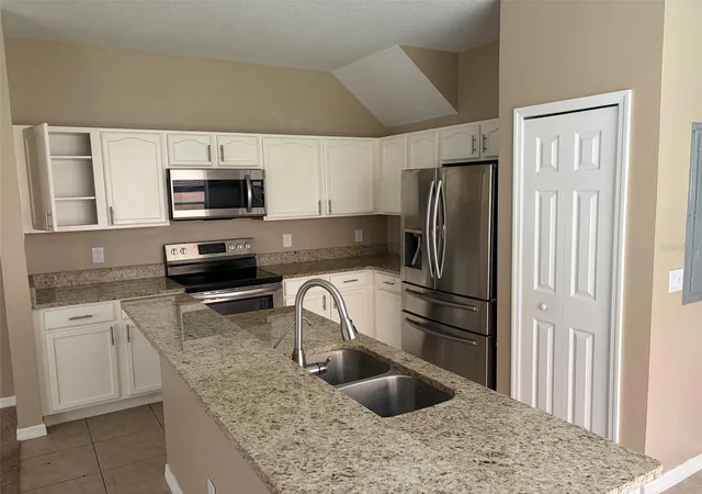 Photo 3 of Townhouse for sale at 1407 Retreat Cir, Clermont, FL 34714 | MLS# O6412805 | Listing updated on 2026-09-09