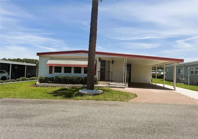 Photo 1 of Manufactured home for sale at 101 Marigold St, Leesburg, FL 34748 | MLS# R4911370 | Listing updated on 2026-09-24