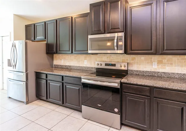 Photo 4 of Single family home for sale at 14148 Finsbury Dr, Spring Hill, FL 34609 | MLS# W7886617 | Listing updated on 2026-09-16