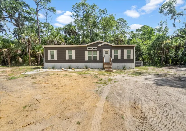 Photo 2 of Manufactured home for sale at 375 Sapp St, Inglis, FL 34449 | MLS# OM727000 | Listing updated on 2026-09-24