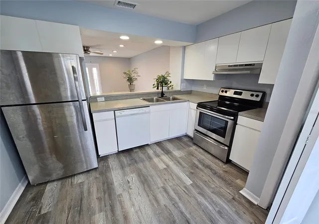 Photo 2 of Townhouse for sale at 13817 Stone Ml Way, Tampa, FL 33613 | MLS# A4697670 | Listing updated on 2026-09-09