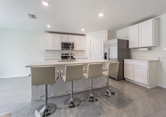 Photo 4 of Single family home for sale at 9213 Mission Bay Pl, Tampa, FL 33637 | MLS# TB8521534 | Listing updated on 2026-09-26