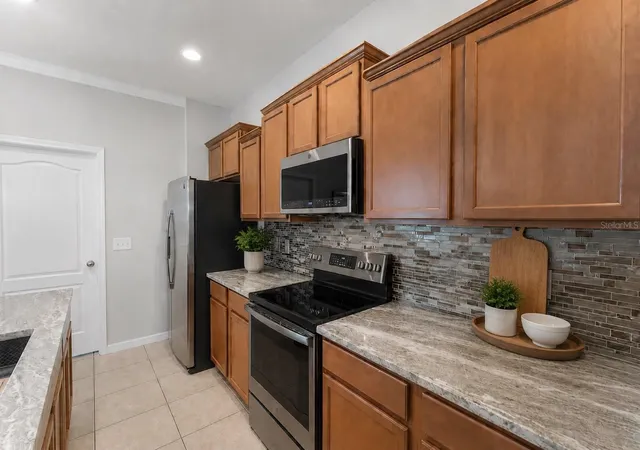 Photo 3 of Sale Pending at 9143 Savannah Ainsley Ln, Orlando, FL 32832 | MLS# O6419021 | Listing updated on 2026-10-29
