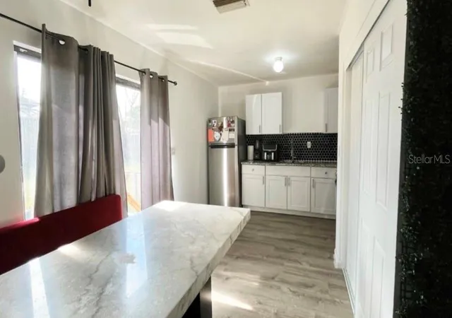 Photo 3 of Single family home for sale at 7011 Conifer Dr, Tampa, FL 33637 | MLS# TB8522576 | Listing updated on 2026-09-17