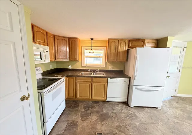 Photo 3 of Manufactured home for sale at 14224 Sandhurst St, Brooksville, FL 34613 | MLS# W7887146 | Listing updated on 2026-09-16