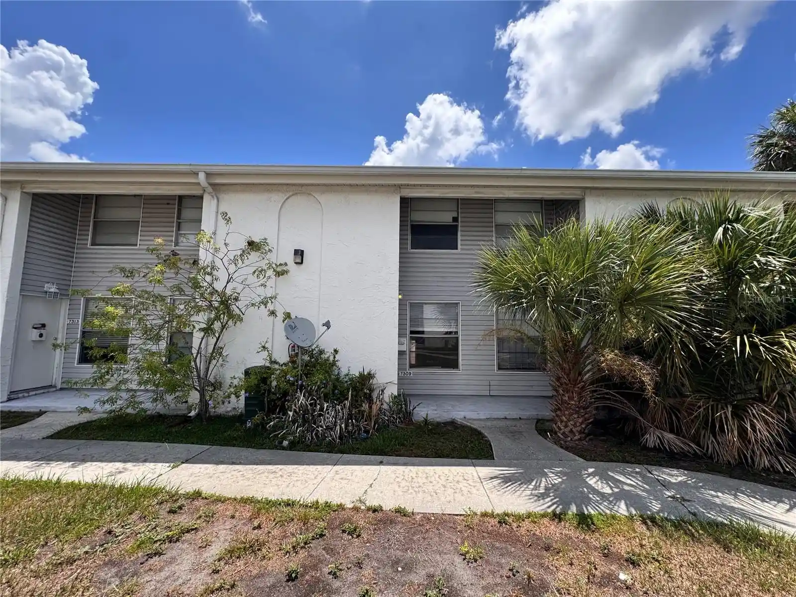 Listing Photo 1 - Condo for sale in 7309 Jackson Springs Rd located at 7309 Jackson Springs Rd, TAMPA, FL 33634 - Unit #7309