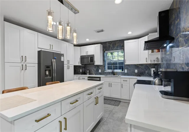 Photo 2 of Single family home for sale at 6822 S Wall St, Tampa, FL 33616 | MLS# TB8525151 | Listing updated on 2026-10-21
