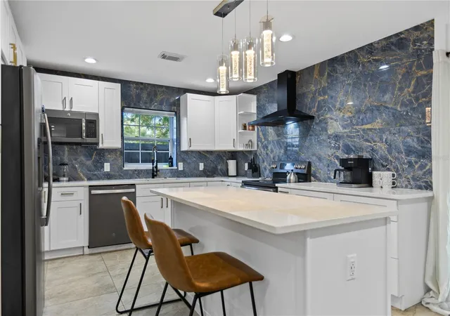 Photo 4 of Single family home for sale at 6822 S Wall St, Tampa, FL 33616 | MLS# TB8525151 | Listing updated on 2026-10-21