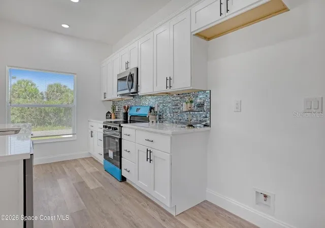 Photo 4 of Single family home for sale at 601 Yardley St SW, Palm Bay, FL 32908 | MLS# O6422922 | Listing updated on 2026-09-09