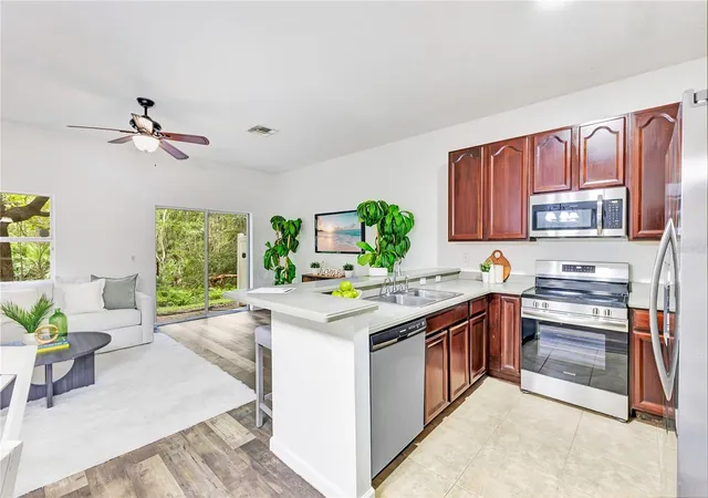 Photo 4 of Townhouse for sale at 16077 Old Ash Loop #19, Orlando, FL 32828 | MLS# O6423314 | Listing updated on 2026-10-08
