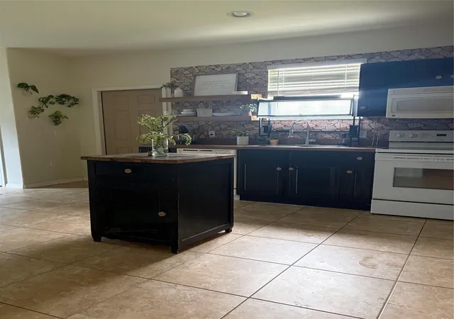 Photo 3 of Single family home for sale at 12460 Himalaya Ave, Punta Gorda, FL 33955 | MLS# C7528618 | Listing updated on 2026-10-02