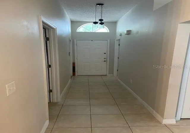 Photo 3 of Single family home for sale at 1048 Winding Water Way, Clermont, FL 34714 | MLS# OM729077 | Listing updated on 2026-09-09