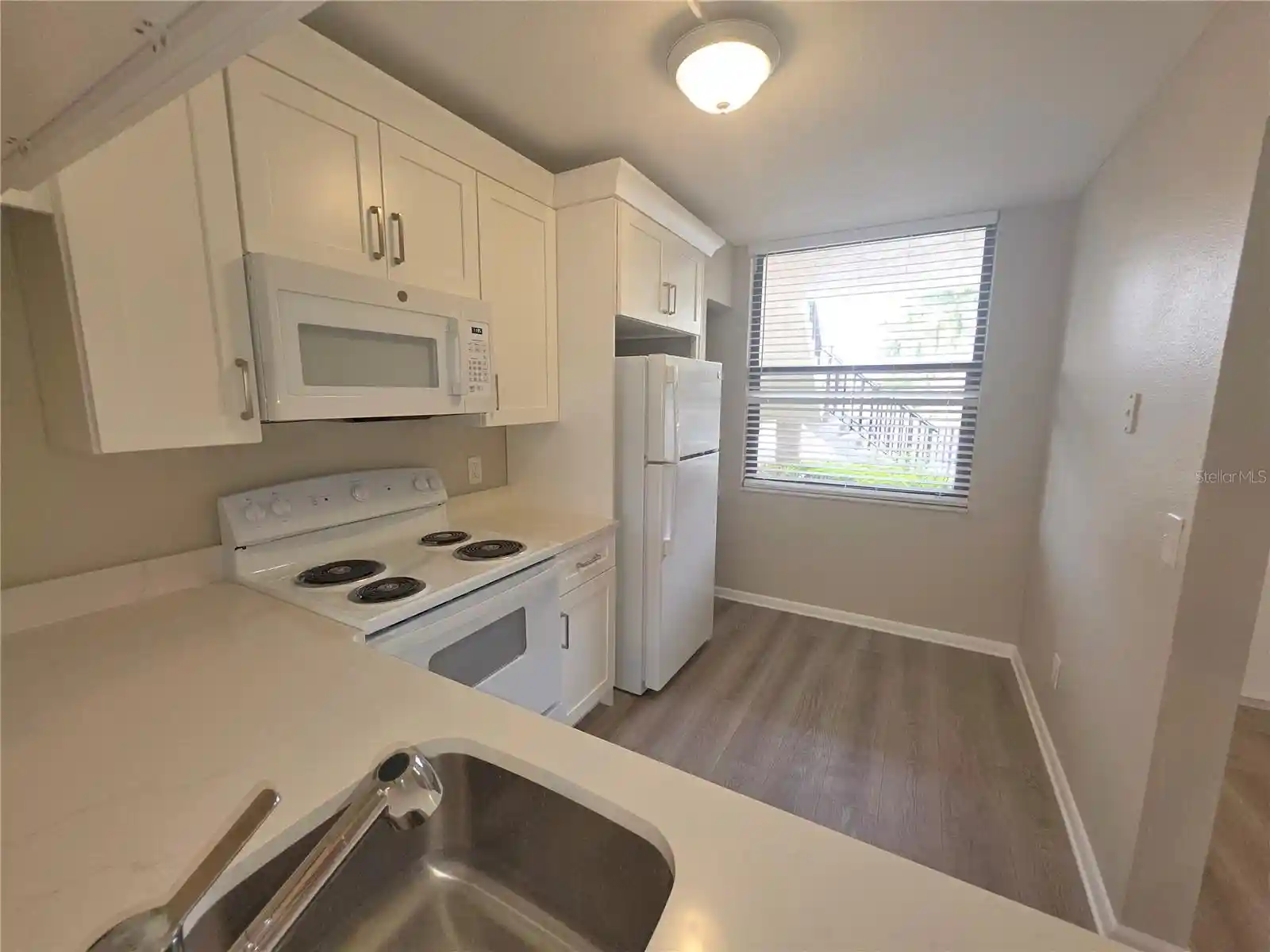 Listing Photo 2 - Condo for sale in 2049 Skimmer Ct W located at 2049 Skimmer Ct W, Clearwater, FL 33762 - Unit #311