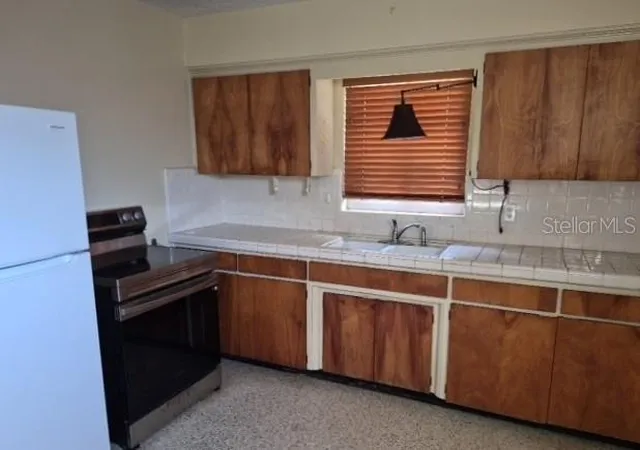 Photo 4 of Single family home for sale at 639 N 75th Avenue, Saint Petersburg, FL 33702 | MLS# TB8534941 | Listing updated on 2026-09-18