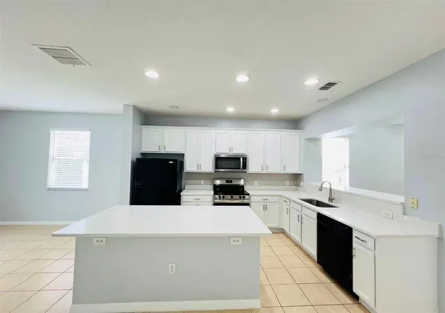 Photo 3 of Townhouse for sale at 5266 Paradise Cay Cir, Kissimmee, FL 34746 | MLS# O6430817 | Listing updated on 2026-09-17