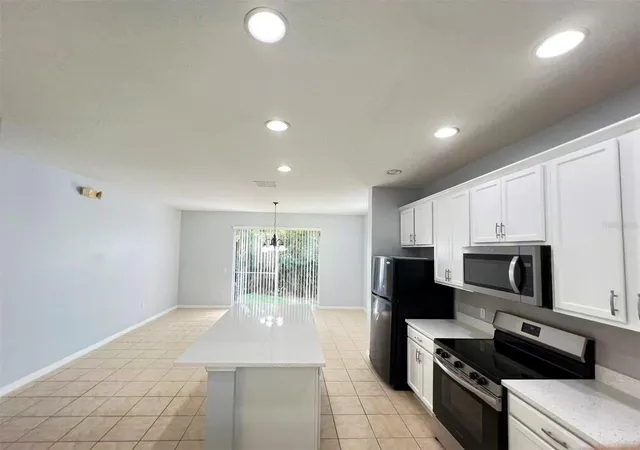 Photo 4 of Townhouse for sale at 5266 Paradise Cay Cir, Kissimmee, FL 34746 | MLS# O6430817 | Listing updated on 2026-09-17