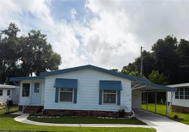 Photo 1 of Manufactured home for sale at 139 Aspen Cir, Leesburg, FL 34748 | MLS# R4911770 | Listing updated on 2026-10-22