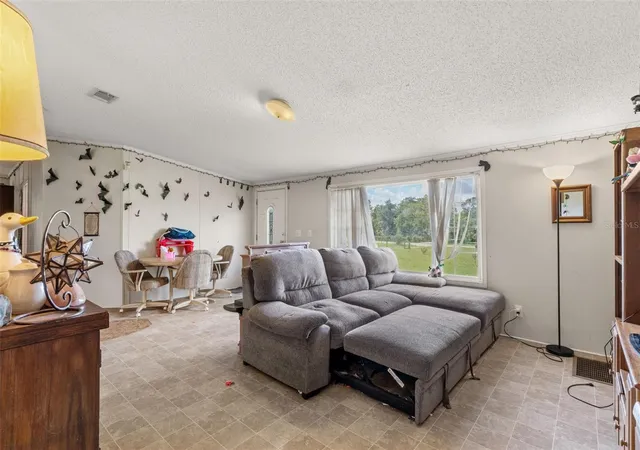 Photo 3 of Manufactured home for sale at 13317 Moon Rd, Brooksville, FL 34613 | MLS# TB8536741 | Listing updated on 2026-09-17