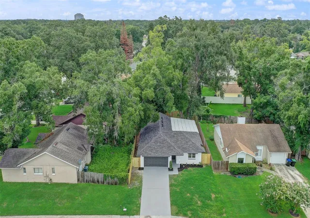Photo 3 of Single family home for sale at 7711 Lakeside Woods Dr, Orlando, FL 32810 | MLS# O6432478 | Listing updated on 2026-09-16