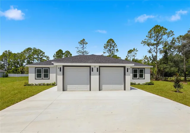 Photo 2 of Sale Pending at 3 Whelan Pl #A & B, Palm Coast, FL 32164 | MLS# FC320702 | Listing updated on 2026-09-09