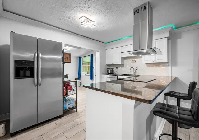 Photo 4 of Single family home for sale at 340 Timbruce Ln Nw, Port Charlotte, FL 33952 | MLS# D6148465 | Listing updated on 2026-10-21