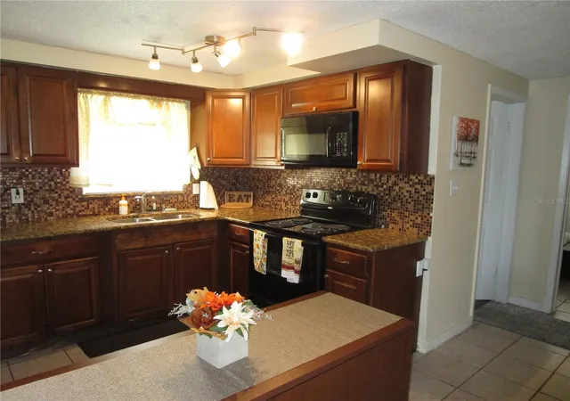 Photo 3 of Single family home for sale at 10801 Fillmore Ave, Port Richey, FL 34668 | MLS# W7888717 | Listing updated on 2026-09-16