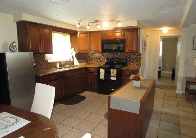 Photo 4 of Single family home for sale at 10801 Fillmore Ave, Port Richey, FL 34668 | MLS# W7888717 | Listing updated on 2026-09-16