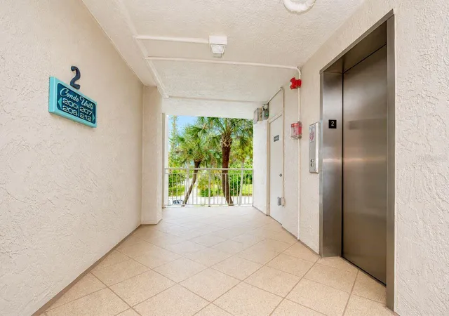 Listing Photo 5 - Condo for sale in building located at 200 1St Ave, St. Pete Beach, FL 33706 - Unit #207